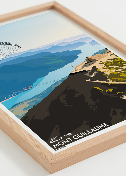 Affiche Mont Guillaume – parapente au dessus du sommet du Mont Guillaume, encadrée bois
